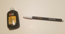 Kodak Lens Cleaner Bottle and red-eye pen: Camera Cleaning Fluid/Pen