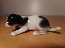 Sculpture statue chien chiot noir blanc biscuit porcelaine 