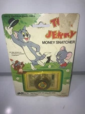 1984 MGM TOM & JERRY MONEY SNATCHER JARU #585