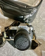 Nikon FG 35 MM camera, Nikon Series e 70-210 Mm F/4. Zoom Lens, Nikon SB-15Flash