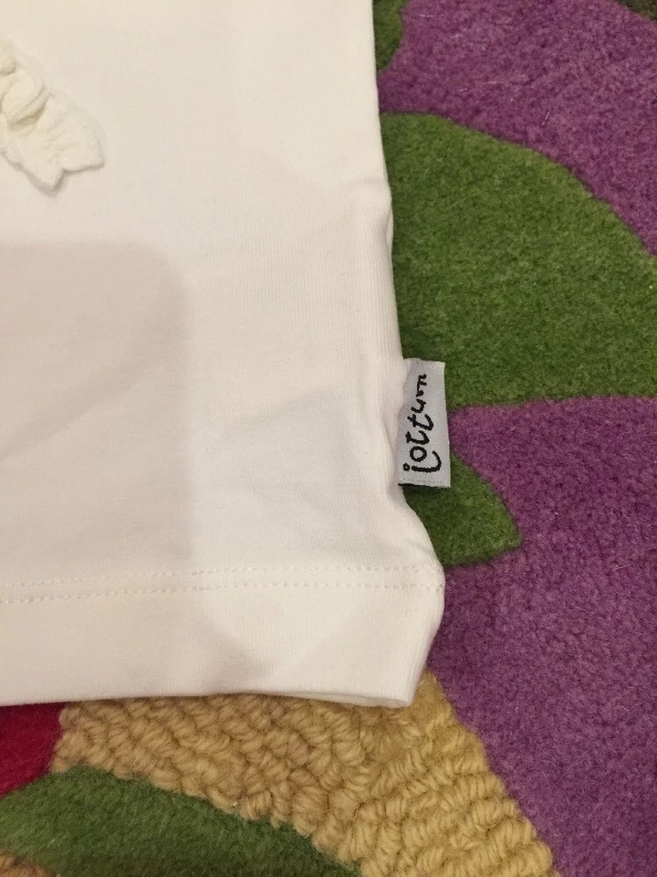 全新带标签 98 3T Jottum 可爱 Nadien 白色蝴蝶结舒适球衣上衣 T 恤 — 第 2/4 张图片