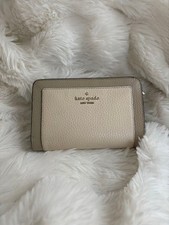 Kate Spade bifold wallet in beige