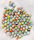 35 VINTAGE MILK GLASS MARBLES SINGLE COLOR  SWIRLS WITH 1 MASTER SHOOTER MARBLE