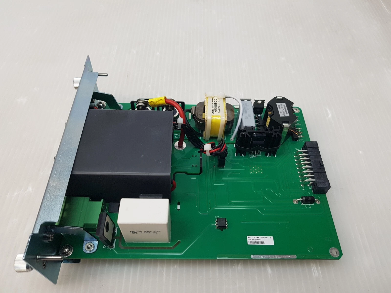 Angled view of the Lumenis LM-EA-1143863-C board with transformer and rear connector
