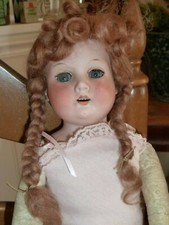 Antique German Bisque head Doll 17 Inches Tall Kid leather body
