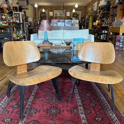 PAIR of early Eames LCW lounge chairs w/ ebonized legs for EVANS, Herman Miller