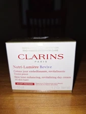 CLARINS Nutri - Lumiere Revive Day Cream  1.7OZ BRAND NEW IN BOX- 4 available 
