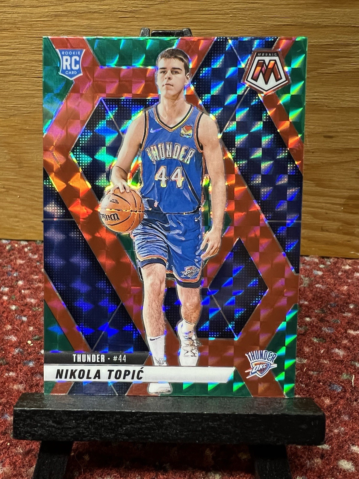 2024-25 Panini Mosaic Rookies Choice Red & Green Prizm Nikola Topic #242 RC