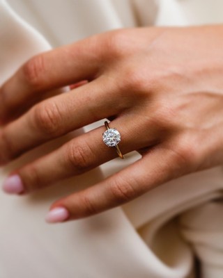 1.75 Carat Round Cut Moissanite Set in a Two-Tone white&Yellow gold Setting Ring