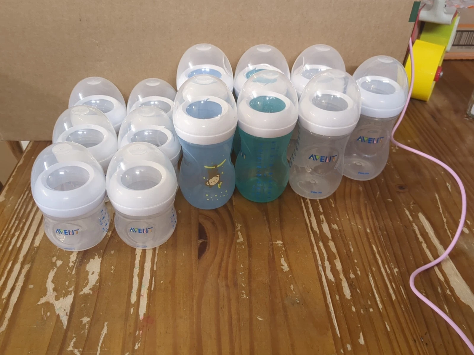 (7) Phillips Avent Plastic Bottles 9 Ounces. (6) 4 Ounce Bottles. 13 Total