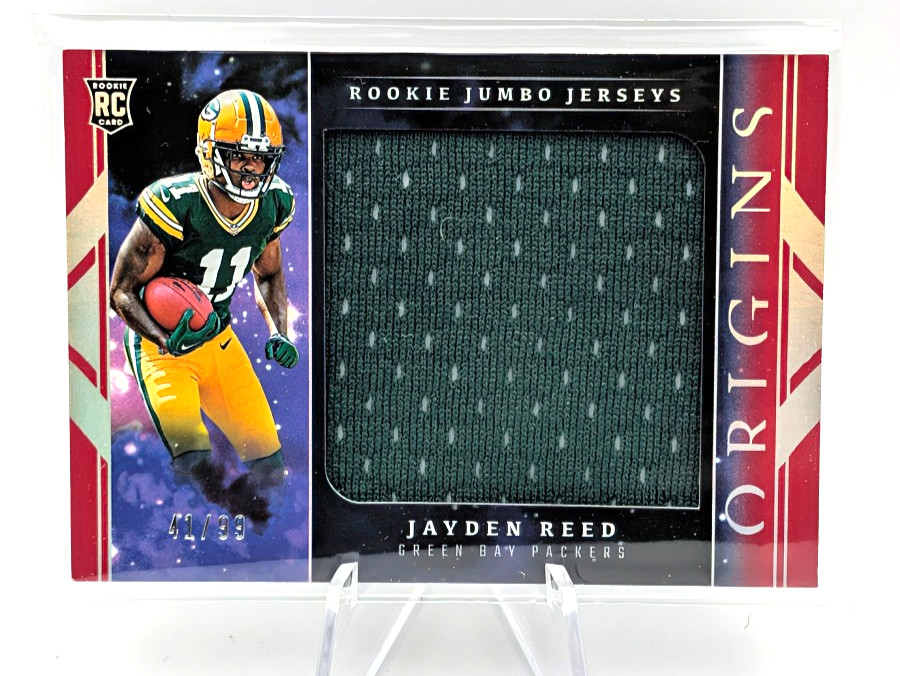 Jayden Reed 2023 Panini Origins Rookie Jumbo Jersey Patch /99 Red #RJJ-JR