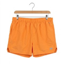 DSG Women s Notched Woven Shorts Light Orange Solid DAW13108