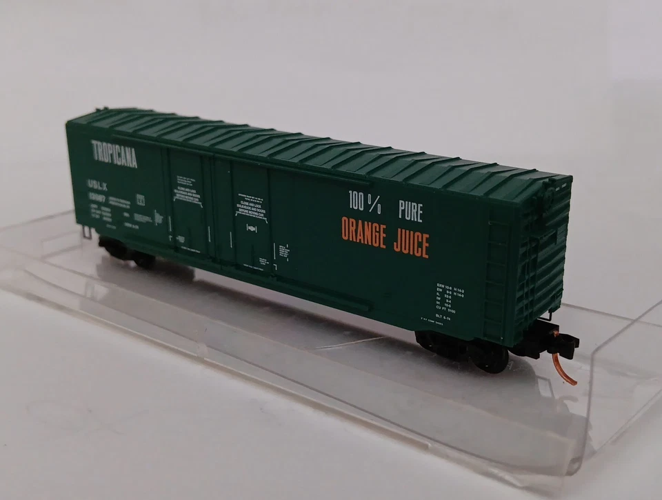 Micro-Trains #75040 Tropicana Orange Juice Boxcar escala N Foto 4 de 4