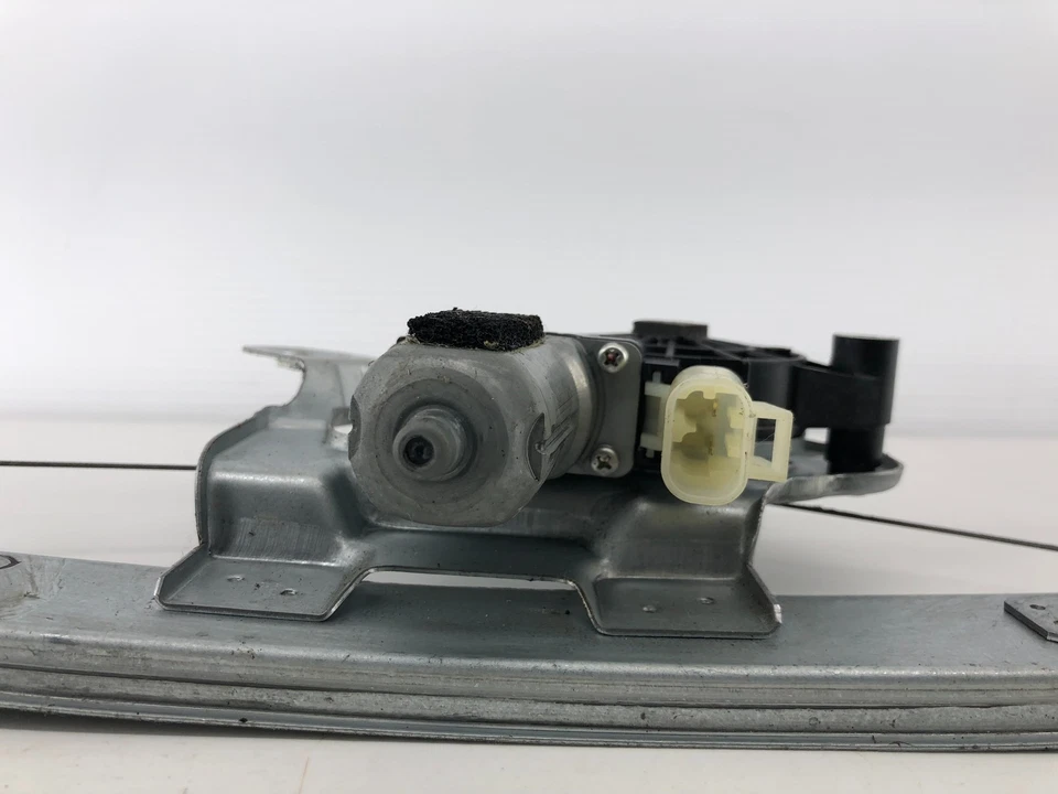 06-10 HUMMER H3 REGULADOR VENTANA PUERTA LADO CONDUCTOR TRASERO IZQUIERDO CON MOTOR OEM Foto 2 de 4