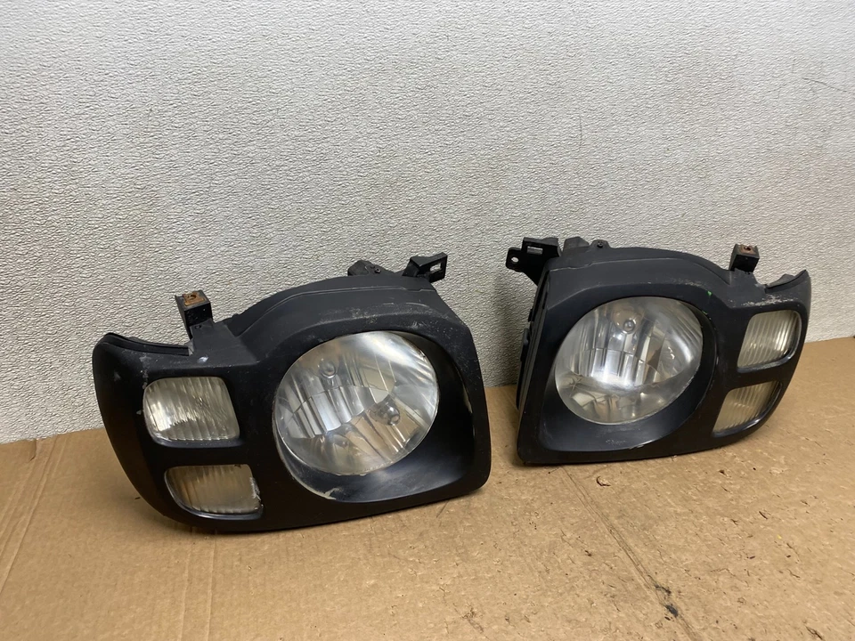 Faros laterales izquierdo+derecho Nissan Xterra 2002 2003 2004 V3215 DW Foto 3 de 4