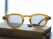 Johnny Depp gray sunglasses blonde oval glasses light gray lens men gray glasses