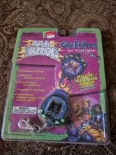 Tiger Electronics Tech Warriors Giga Fighters Twój wirtualny myśliwiec - zapieczętowany