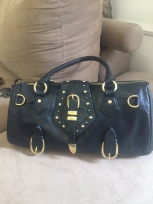 Classic ETRO leather bag black with snake skin and gold metallic embellishments.