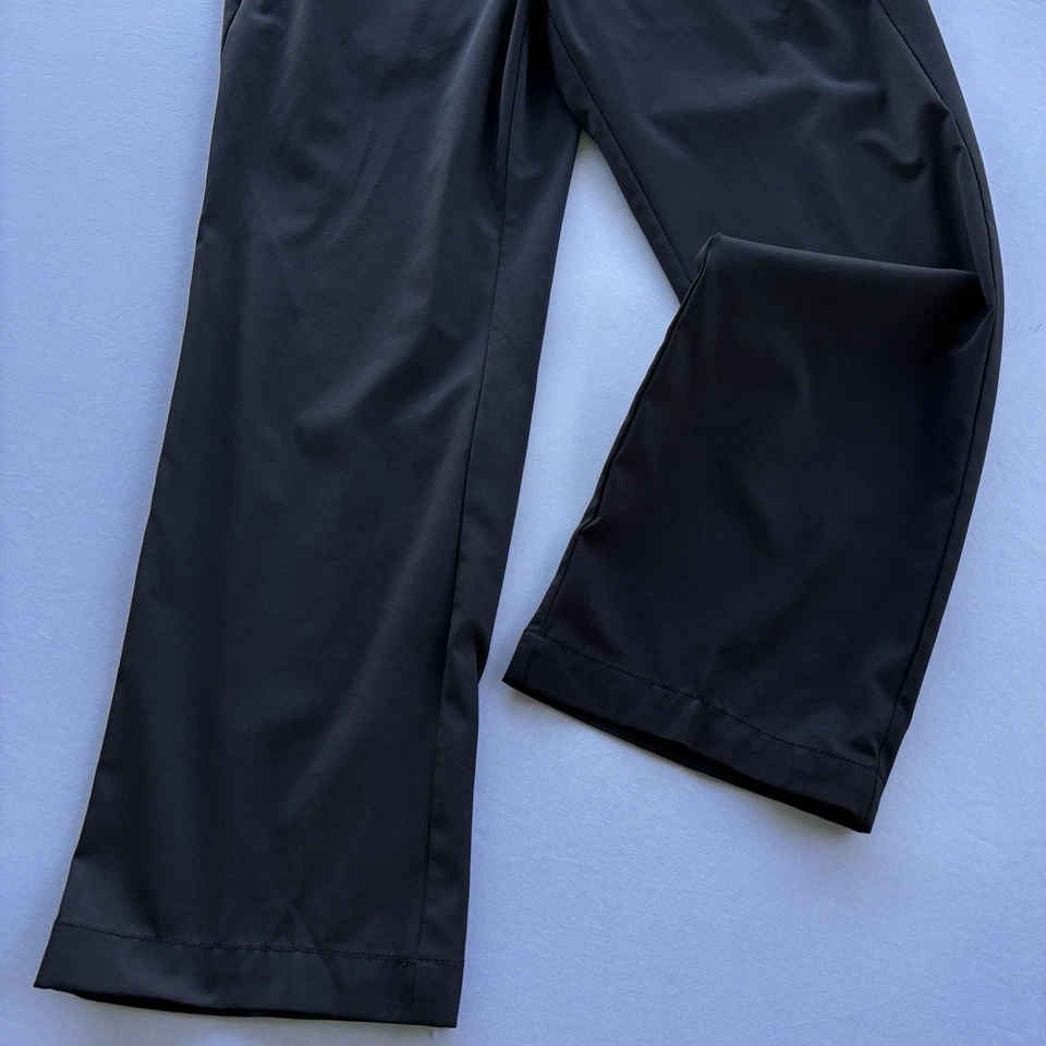 Pantalones de rendimiento de golf Adidas para hombre con logotipo plateado y agarre lateral negros talla 34x32 Foto 3 de 4