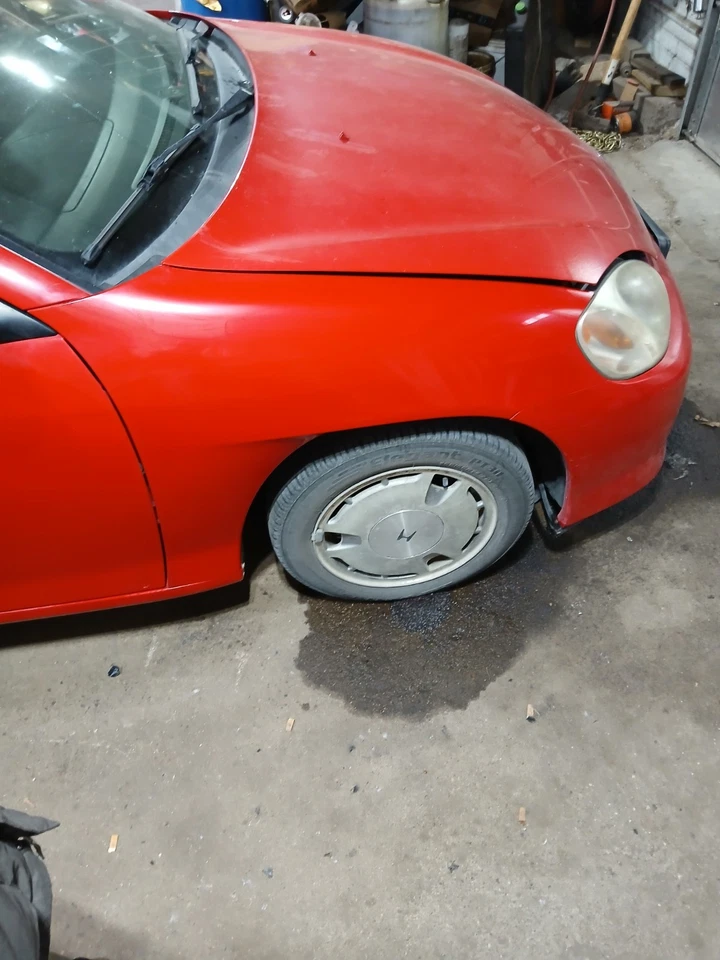 Guardabarros delantero derecho del lado del pasajero Honda Insight 2000-2006 OEM - rojo Foto 2 de 4