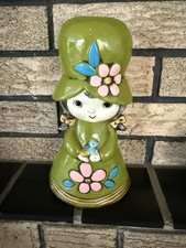 Banco de monedas Holiday Fair Chalkware 1968 Flower Power Girl pintado verde Japón
