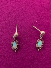 14K Yellow Gold Earrings With Dangle Opals 1....