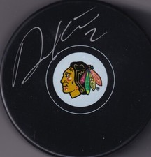 BECKETT DUNCAN KEITH SIGNED CHICAGO BLACKHAWKS LICENSED LOGO PUCK 1W456849
