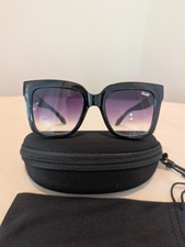 Quay Australia Icy sunglasses in a black frame with a gradient lens