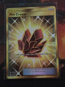 Pokemon TCG SM Unbroken Bonds Fire Crystal 231/214 Gold Secret Rare NM