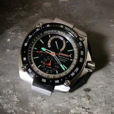 Seiko Quartz  7T86-0AB0  New 100m  Sportura Calendario Perpeuo NOS NEW