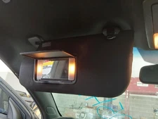 Used Left Sun Visor fits: 2014 Ford Taurus illuminated L. garage door opener Lef