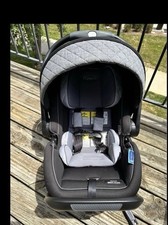 Graco Baby Car Seat In Very Good Used Condition with Cover