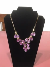 New Vintage gold color necklace with purple rhinestone 16 to 18 inches long