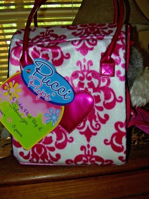 pucci pups pink and white plush bag and schnauzer
