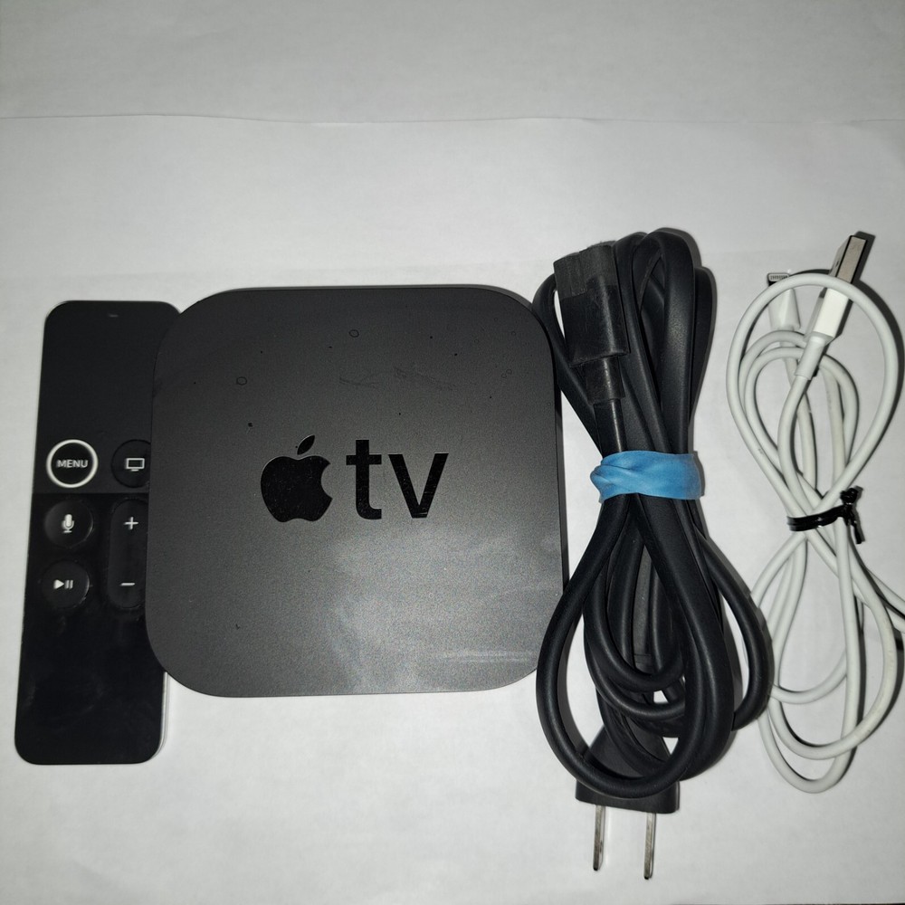 Apple TV 4K (1st Generation) complete with remote control and charger