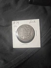 1879-CC Morgan Silver Dollar - Solid Fine F details from the Carson City mint