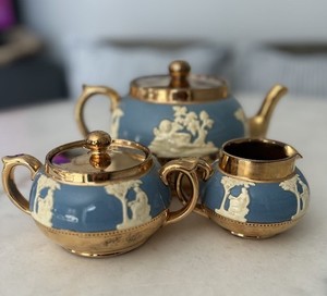 Porcelain tea set with neoclassical reliefs by Gibson's Staffordshire