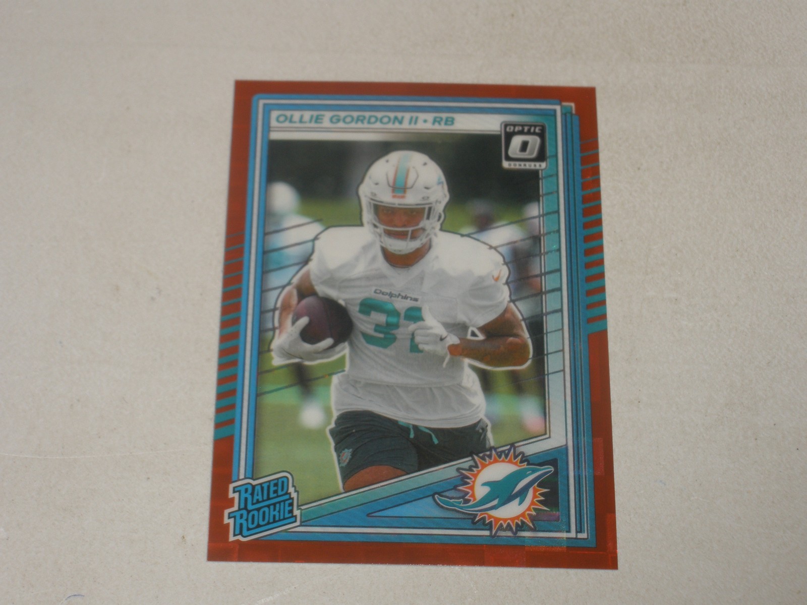 2025 Donruss Rated Rookie Optic Preview Red Pandora Prizm Ollie Gordon II RC B