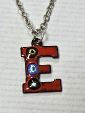 Red initial 'E' pendant on chain necklace