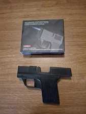 Gun Shaped Lighter That Holds Cigarettes.  