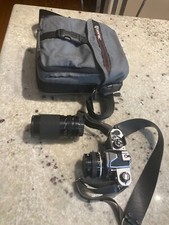 Nikon FM 35mm SLR Film Camera Silver w/ Ai-s NIKKOR 50mm F/1.8 + Tokina 35-135mm