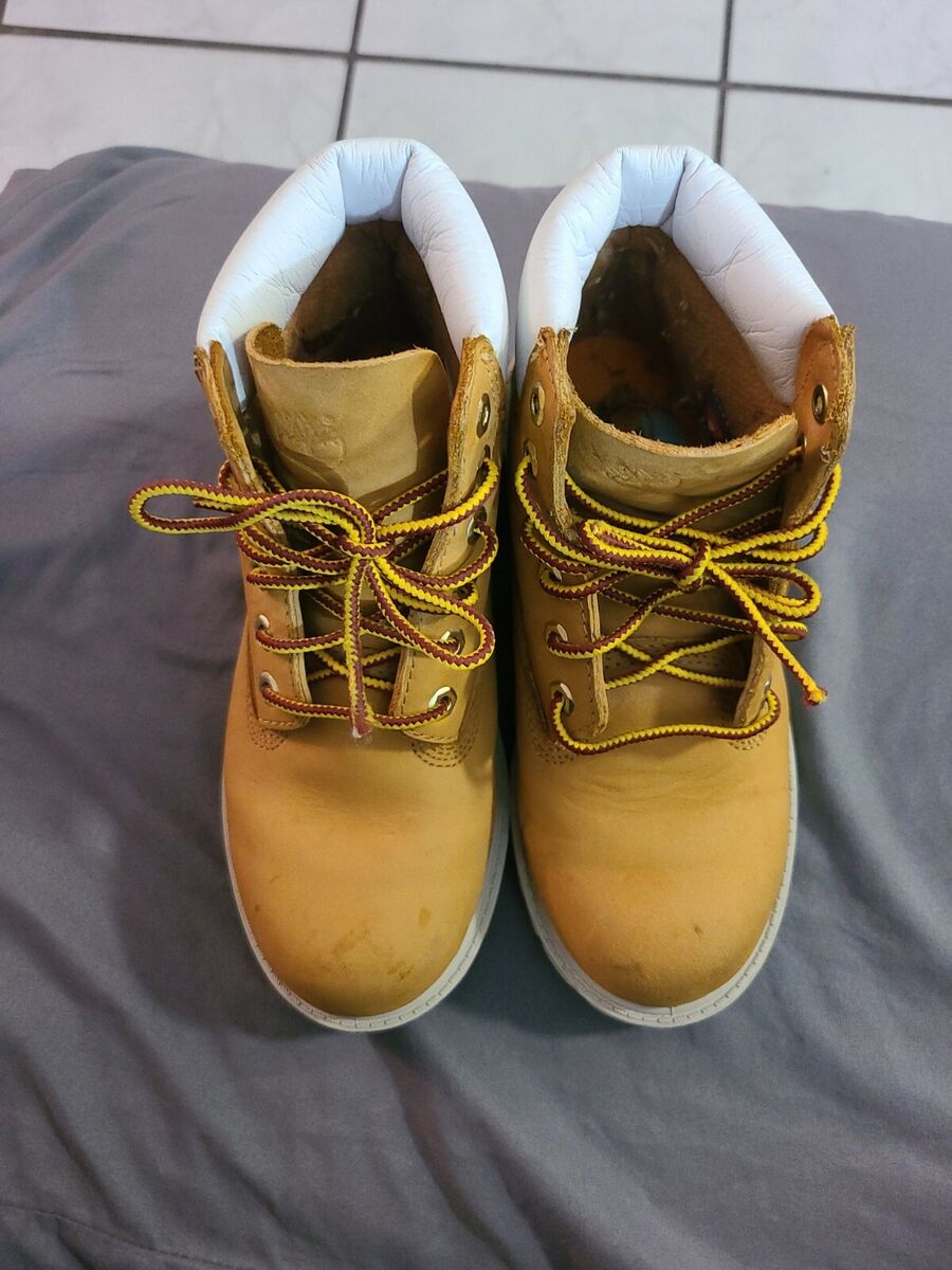 Timberland waterproof boots white trim of white cuffs sz 1.5 Timberland waterproof boots white trim of white cuffs sz 1.5
