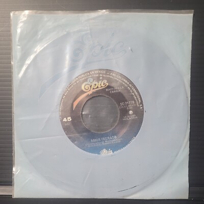 RAFFAELLA CARRA Amor Ingrato / Hay Que Venir Al Sur 45 RPM Epic Mexico VG+