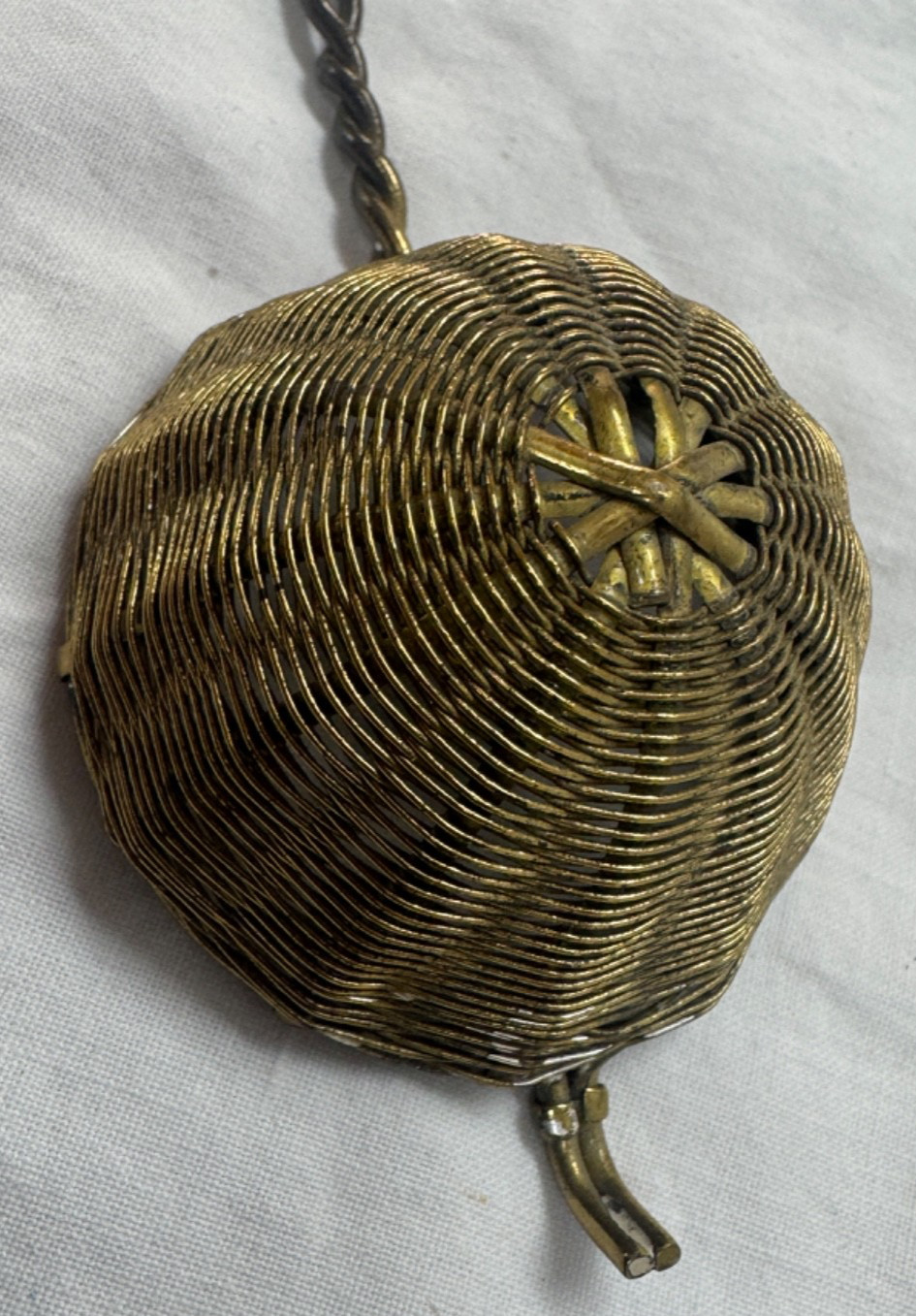 TWO VINTAGE TEA STRAINERS