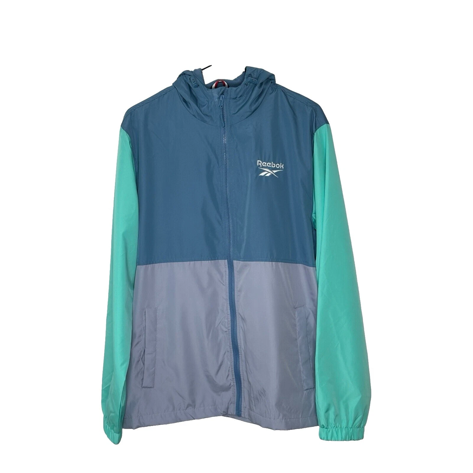 Rompevientos sólido Reebok abrigos, chaquetas y chalecos para hombres