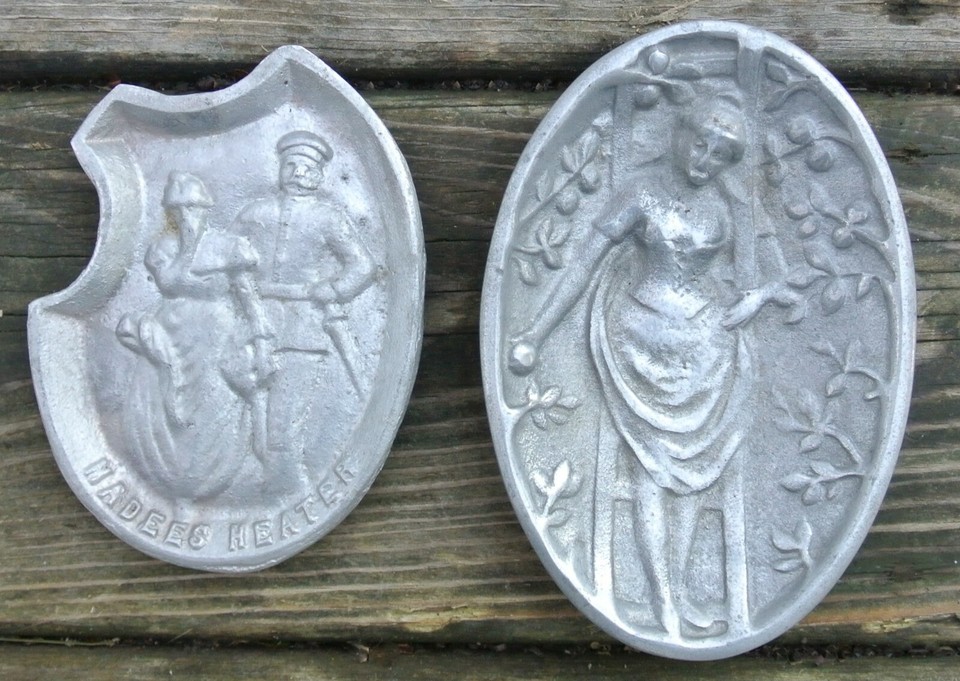 Vintage 'Hotter Nell Handees' figural metal ashtrays — campy mid-century risqué novelty kitsch that doubles as a conversation-piece trinket dish.