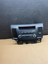 2010-2015 Mitsubishi Lancer Radio AM/FM CD Player Air Vent T4355 DG