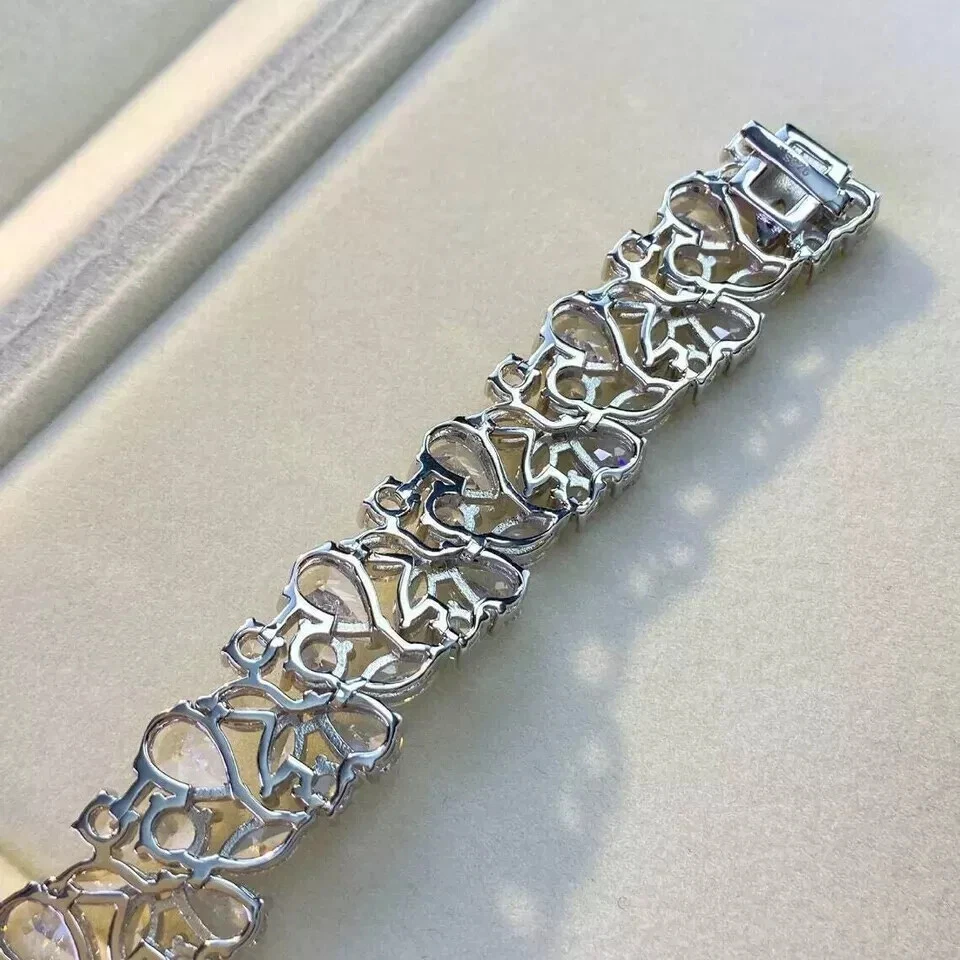 Brazalete de tenis para mujer de diamantes creados en laboratorio con corte pera de 9 quilates enchapado en oro blanco de 14 quilates Foto 3 de 4