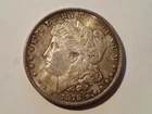 1878 Morgan Silver Dollar, 8 Tailfeathers