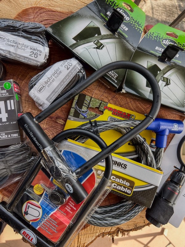 Lot of Cycling bike parts some Tubes Pumps lots of randoms